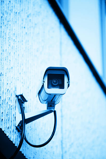 Security big brother is watching you shooting guard stock pictures, royalty-free photos & images