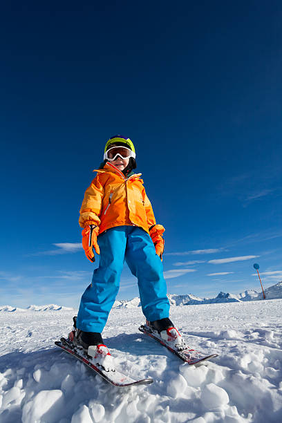 istock Smiling boy wearing ski mask and helmet in winter 465161106