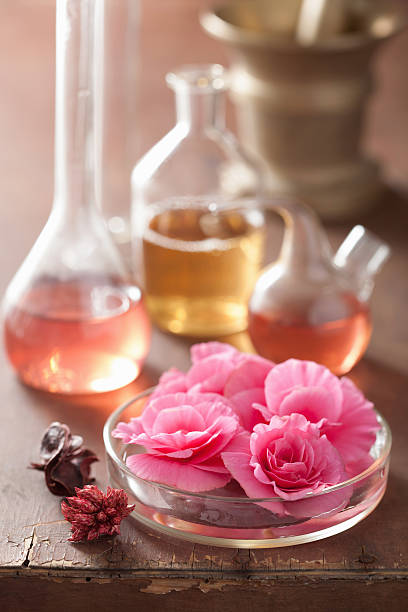 istock aromatherapy and alchemy with pink flowers 465161133