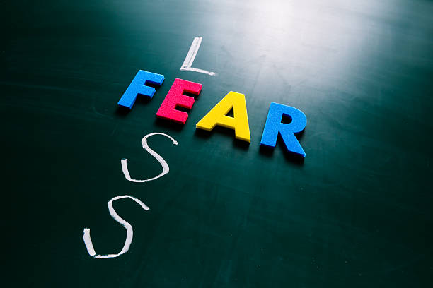 istock Less fear concept on blackboard 465161766