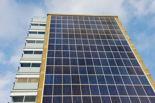 Solar panels on the roof of an apartment building in a residential district in Stockholm.