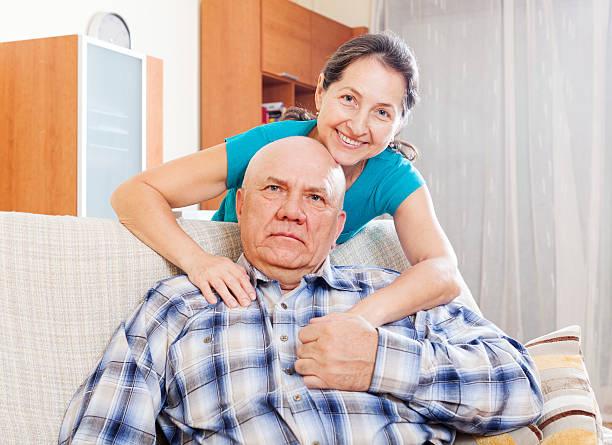 istock cheerful  mature woman with elderly husband 465164313