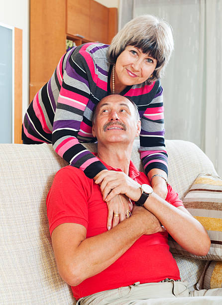 istock Loving cheerful senior couple together 465164325