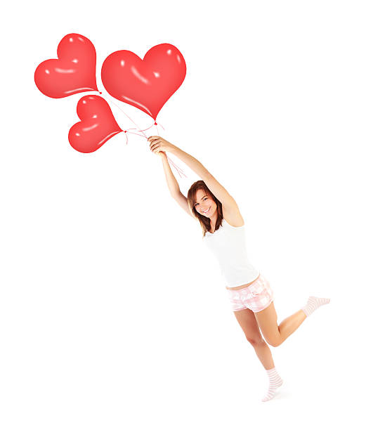 istock Girl flying on air balloons 465170443