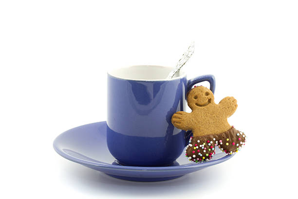 Two cups of hot coffee on the table in front of Christmas tree