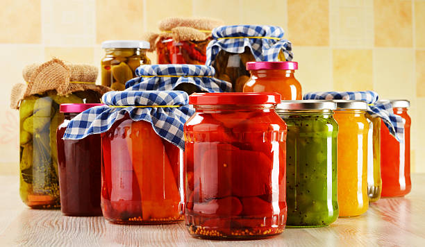 istock Composition with jars of pickled vegetables. Marinated food 465176121