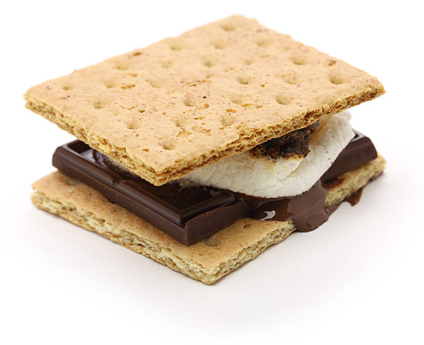 s’more, campfire treat S’more is a campfire treat popular in the United States and Canada. smore photos stock pictures, royalty-free photos & images