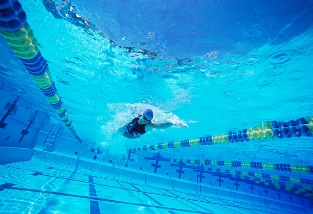 istock Young female swimmer in competition 465177437