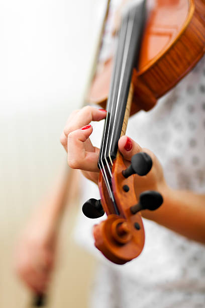 istock Woman playing violin 465182167