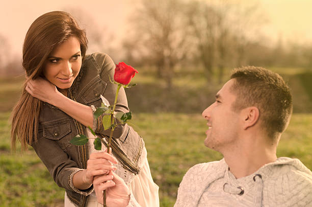 istock Beautiful embraced couple in the park 465184101