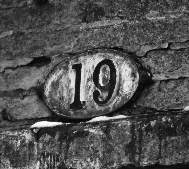 Number 19 sign black and white