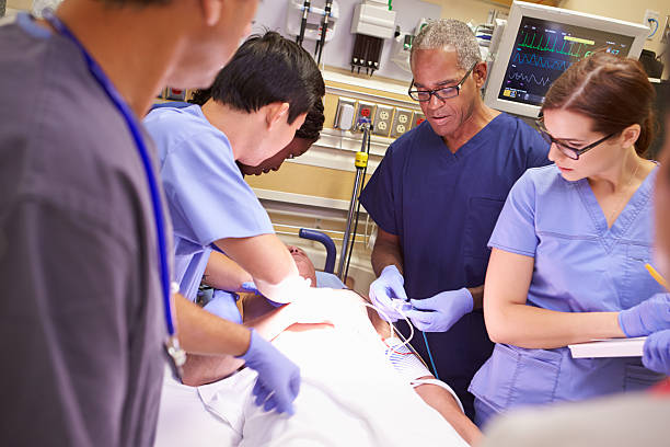 istock Emergency room medical team working on a patient 465193859