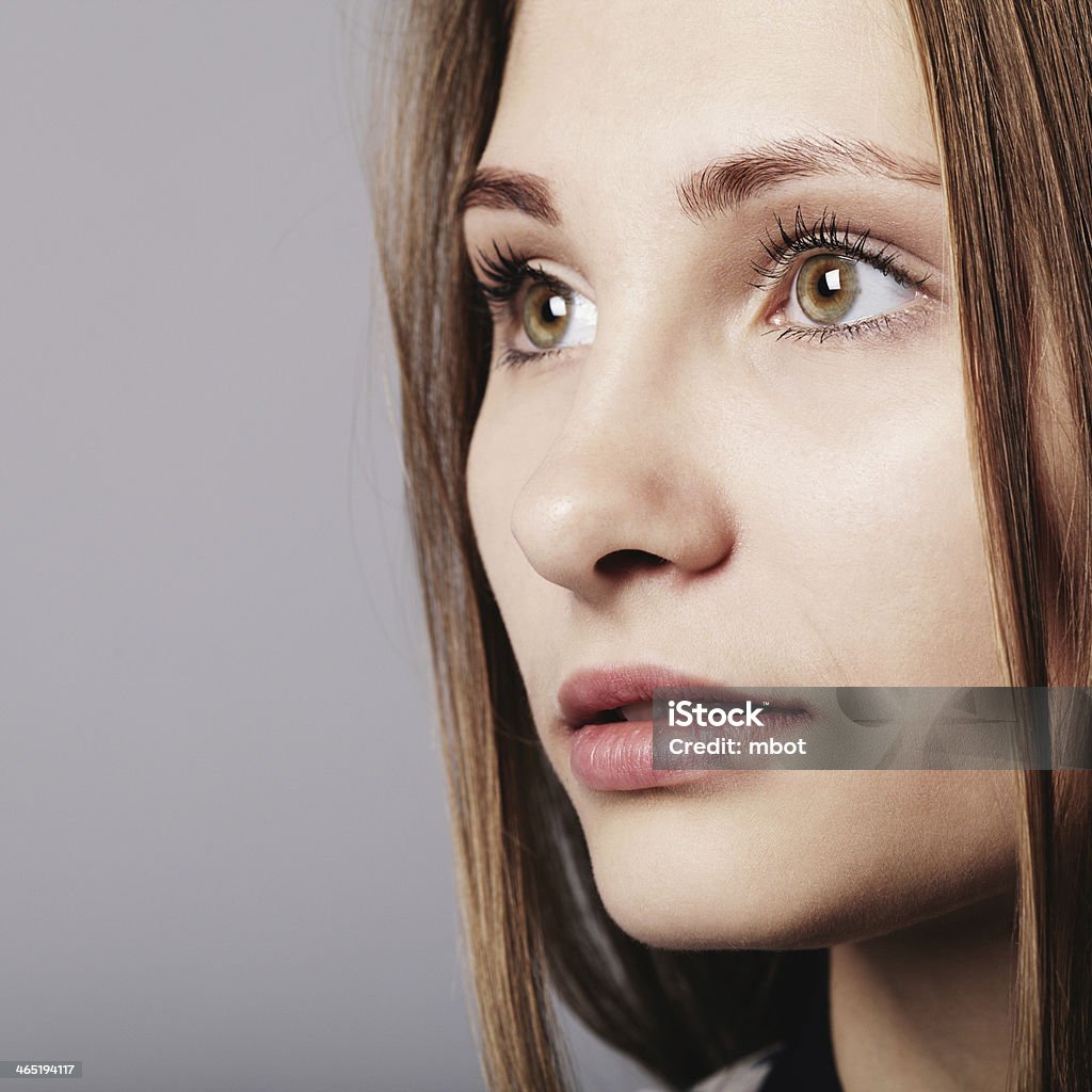 Fashion girl posing on grey background Fashion girl posing in grey background Adult Stock Photo