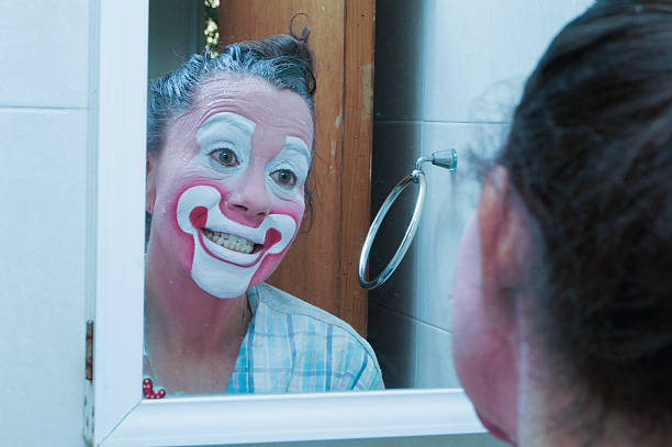morning activity. washing face. looking in mirror
