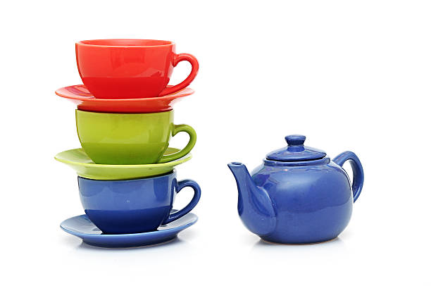 istock colorful tea cups with teapot isolated on white 465199007