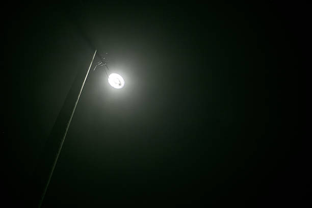 istock Foggy night street lamp 465200515