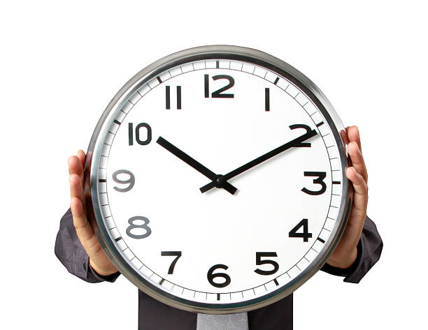 istock Businessman with alarm clock 465201131