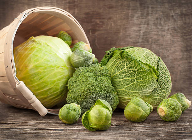 istock Still life with assortment cabbages on wooden background 465202687