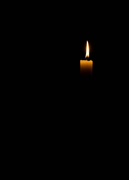 istock Candle burning in the darkness 465207203