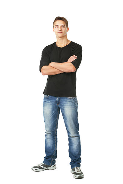 young man standing Full length portrait of young man standing with hands folded against isolated on white background gray eyes photos stock pictures, royalty-free photos & images