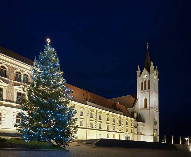 istock Christmas tree and church tower slant 465207855