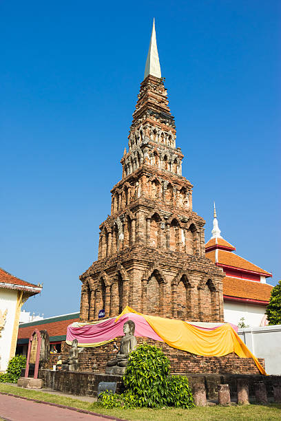 istock Old brick pagoda at Wat Phra That Hariphunchai , Lamphun, Thailand 465209951