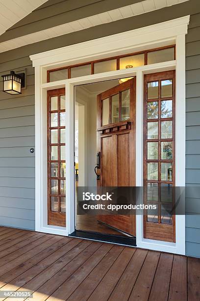 Exterior Shot Of An Open Wooden Front Door Stock Photo - Download Image Now - Door, Doormat, House