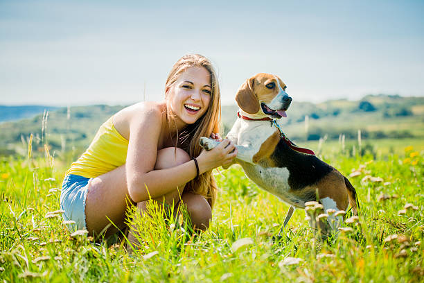istock Teenager with her dog 465223893