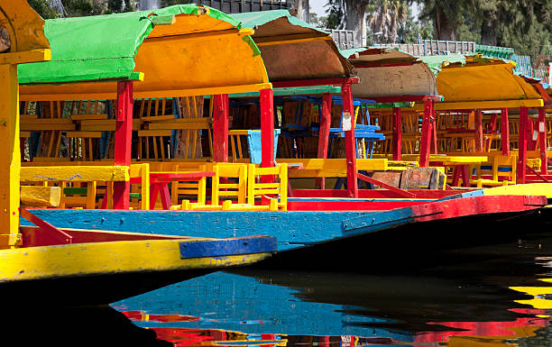 Colourful Mexican gondolas at Xochimilco's Floating Gardens stock photo