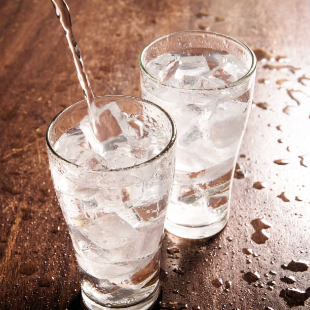 istock Two glasses of iced water with ice cubes 465231922
