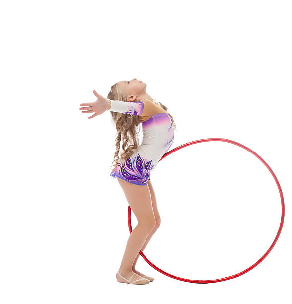 istock Flexible gymnast dancing with hoop in studio 465232145