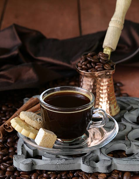 istock Still life cup of espresso, beans and coffee pot 465233655