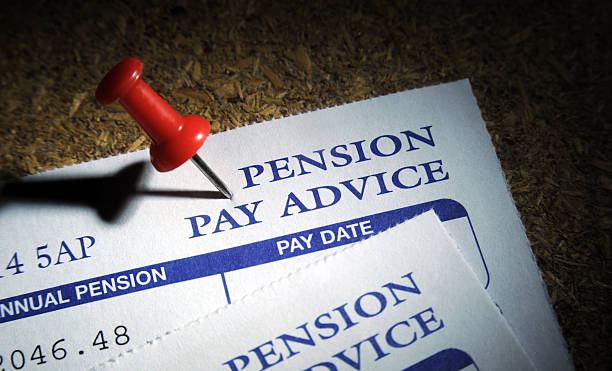 istock PRIVATE PENSION PAY ADVICE ON NOTICE BOARD WITH PIN 465244635