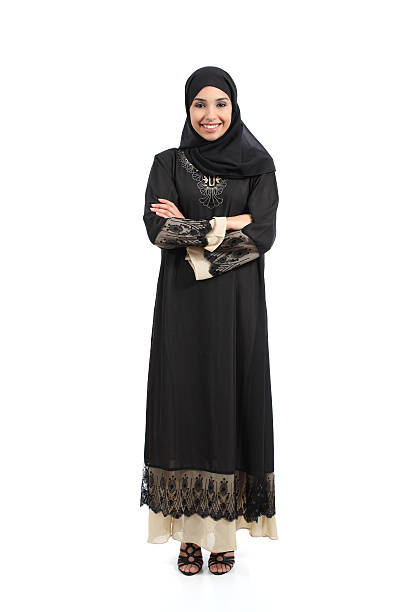 arab saudi mujer posando pie feliz - women islam middle eastern ethnicity arabic style fotografías e imágenes de stock