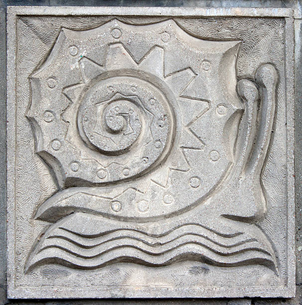 istock old bas-relief of fairytale snail 465246941