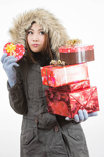 istock asian woman valentines day 465247325