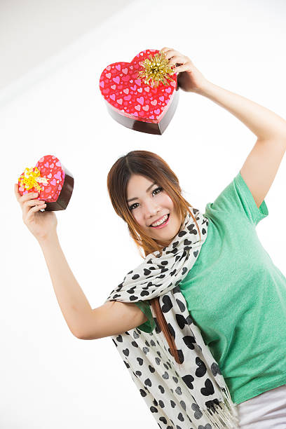 istock asian woman valentines day 465247471