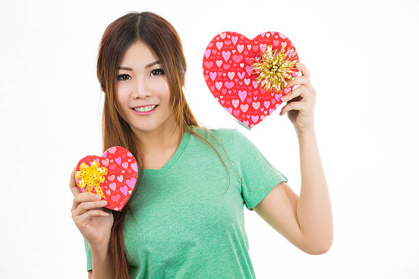 istock asian woman valentines day 465247733