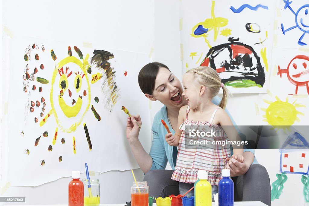 Teacher And Pupil In Pre School Art Class Happy Smiling Teacher And Pupil In Pre School Art Class Fun Stock Photo