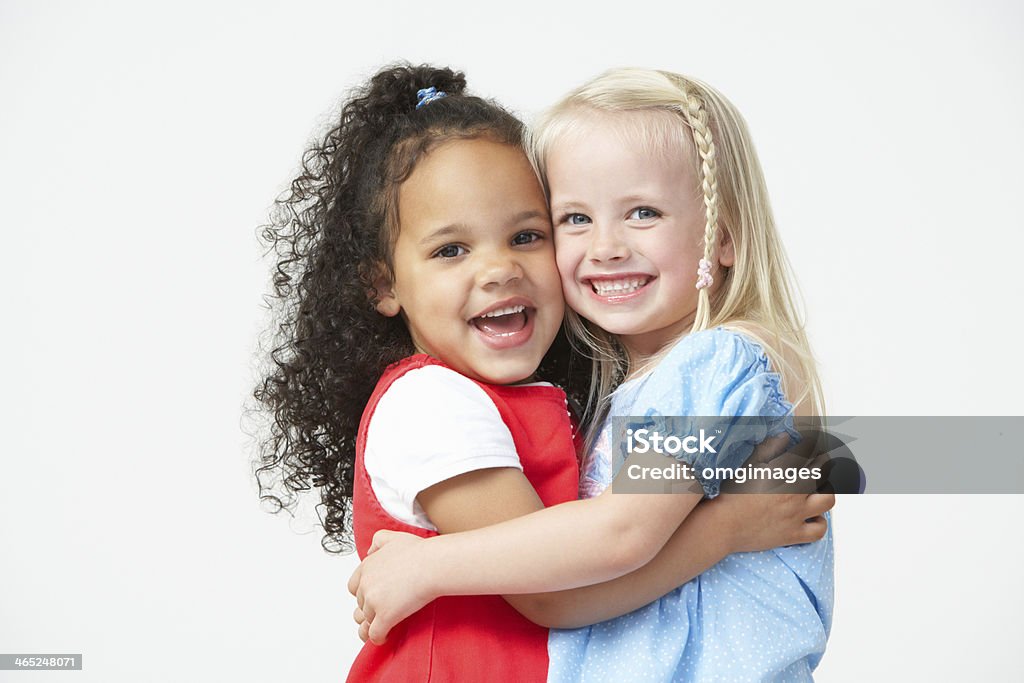 Two Pre School Girls Hugging One Another Child Stock Photo