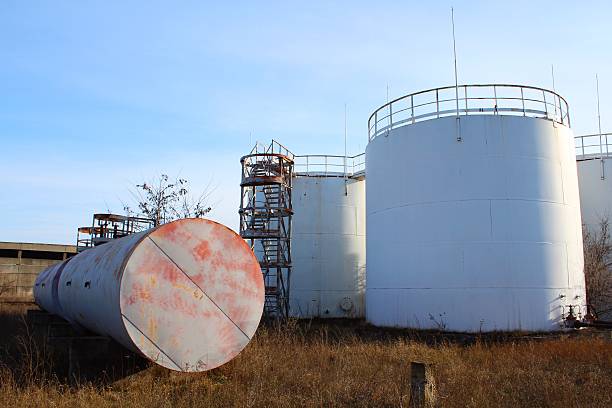 istock Old oil storage tanks park with stairs 465250143
