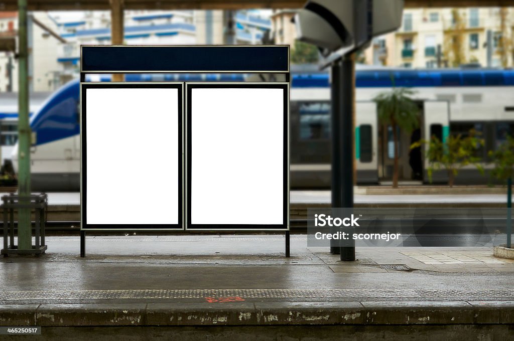 An empty blank billboard at the train station during daytime Empty blank billboard at train station Station Stock Photo