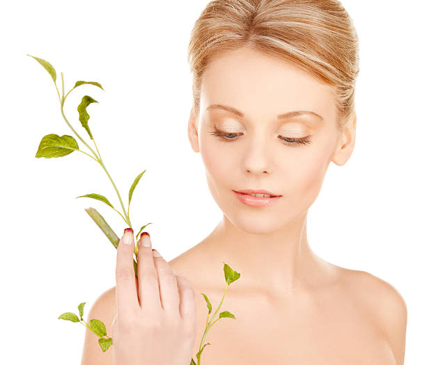 istock woman with green sprout 465250705