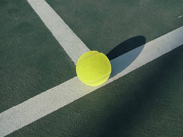 istock Tennis ball in court 465250893