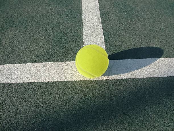 istock Tennis ball in court 465250897