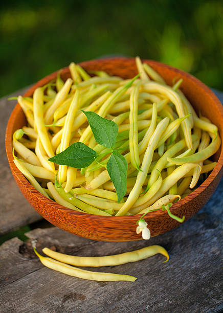 istock yellow kidney beans in a bowl on wooden table 465257007