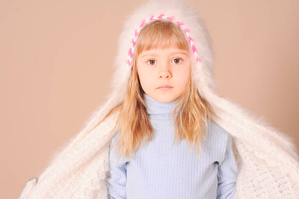 istock Cute little girl wearing winter clothes 465257591