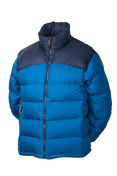 Blue down jacket shot of down winter jacket in studio isolated on white with clipping path winter coat stock pictures, royalty-free photos & images