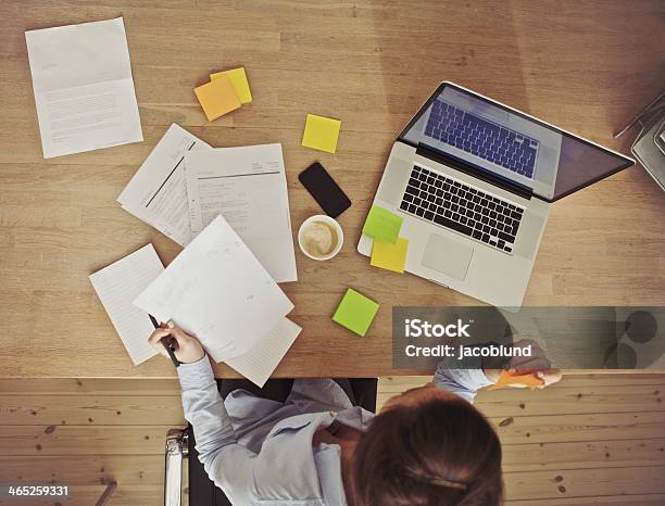Overhead View Of Businesswoman Working At Desk Stock Photo - Download Image Now - Brown Hair, Businesswoman, Desk