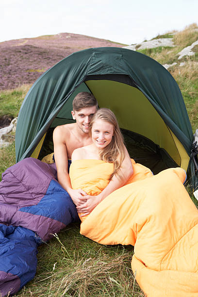 istock Young Couple On Camping Trip In Countryside 465260511